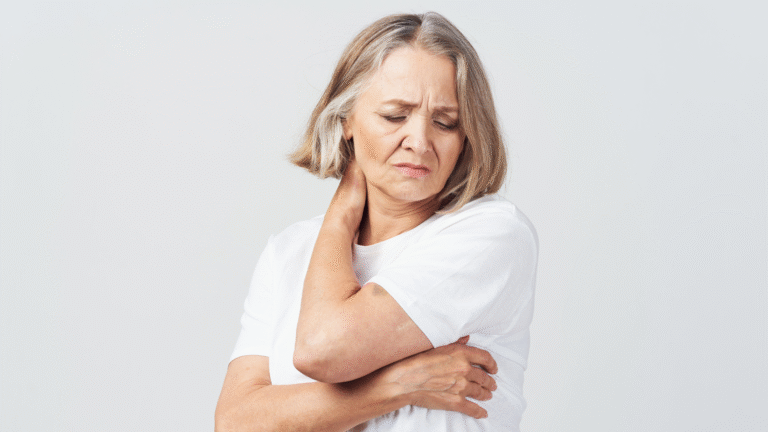 Woman experiencing menopause-related joint, muscle, and nerve pain