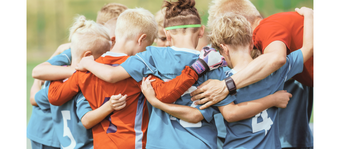soccer kids in a huddle